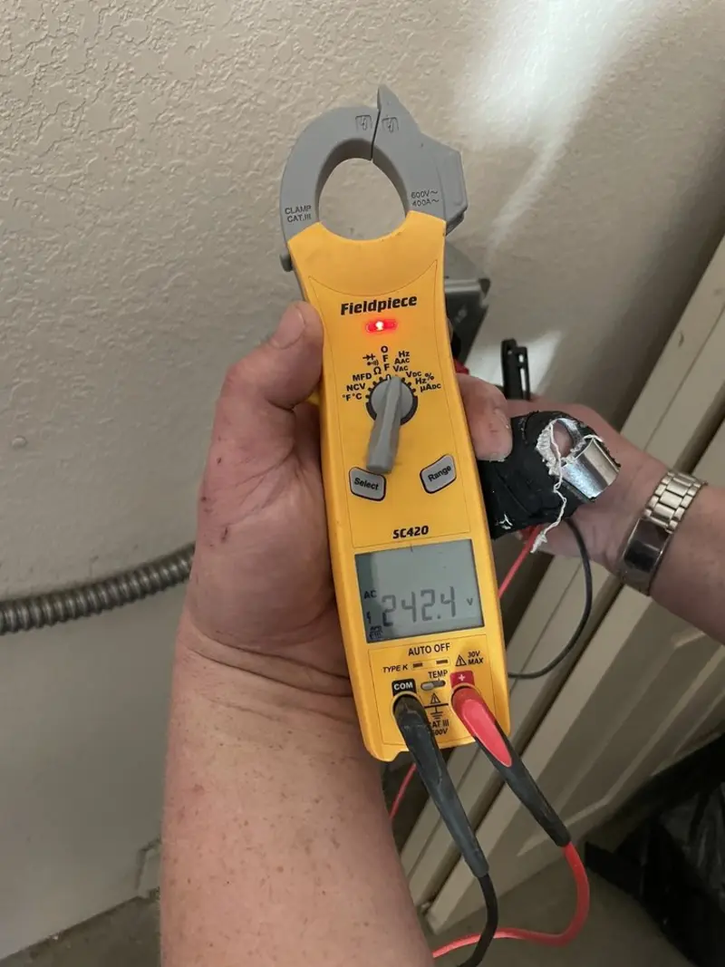 Voltage testing with clamp meter during Generator Installation in Wilton